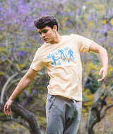 Art of Dance cream colored tee on male dancer