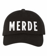 Black Covet Dance Merde Cap on white background