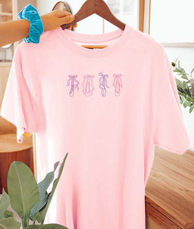 pink tee with ballet pointe shoe drawings