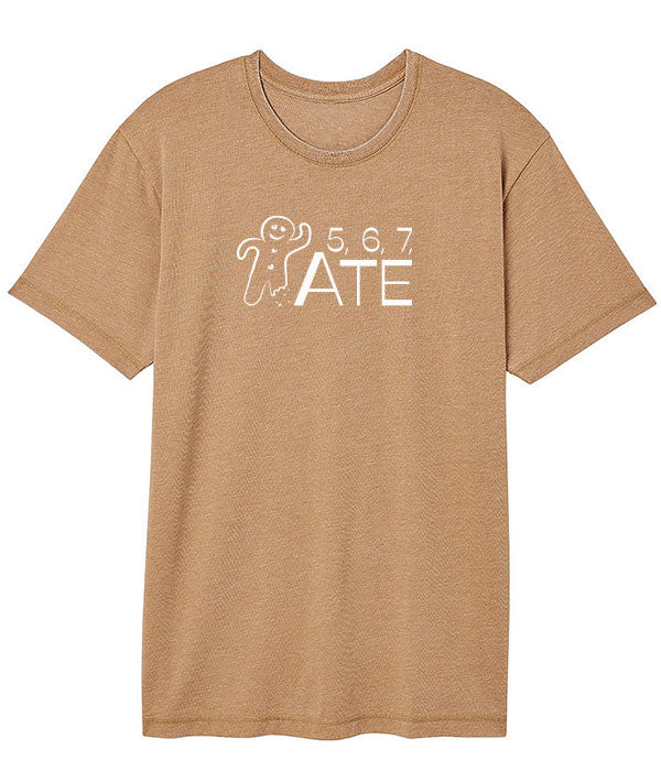 An orange brown t-shirt depicting a Gingerbread man, and text that says "5, 6, 7, ATE"
