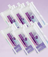 six pouches of Covet Dance 'Dancer Problems Kit' on a light purple background