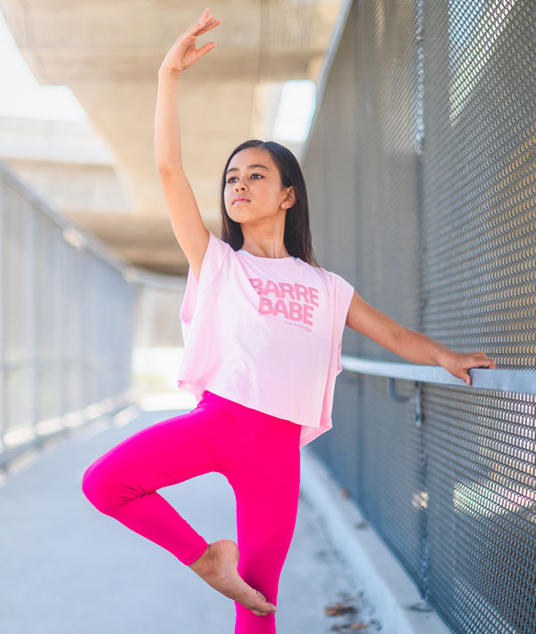 Young ballerina wearing Barre Babe Crop Top