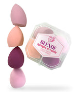 Set of four makeup sponges with a container labeled 'Blendé Sponges En Pointe' on a white background