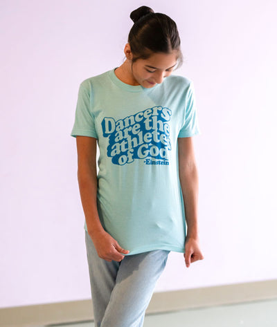 Young dancer wearing blue tee with Dance quote from Albert Einstein