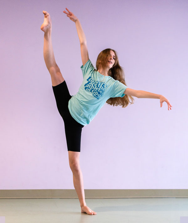 Dancer wearing Einstein Quote tee with "Dancers are the athletes of God"