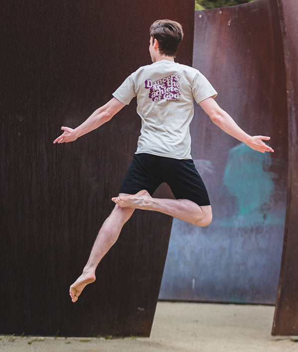 Male dancer at UCLA Sculpture Garden wearing Covet Dance tee