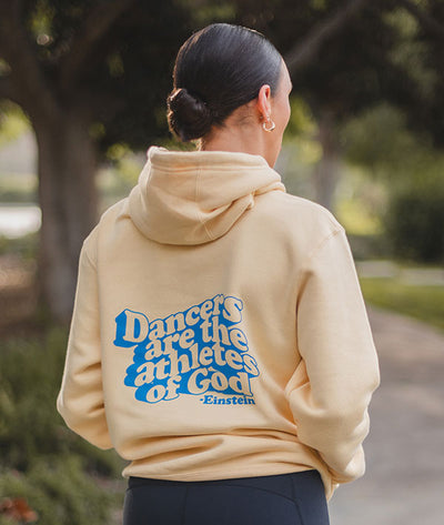 Einstein quote on the back of a yellow hoodie