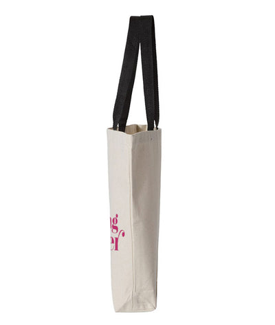 side view of Covet's "It's Giving Dancer" holiday tote bag