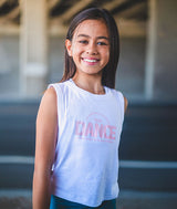 Young dancer wearing Covet Dance tank  that says, "Just Another Day at the Studio" above the word DANCE