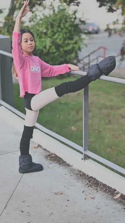 Young dancers showing off her skill while wearing a cute Covet Dance cropped hoodie