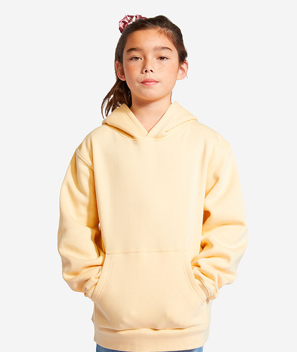 Young dancer wearing yellow hoodie