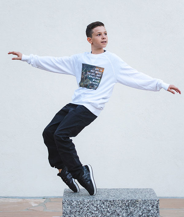 young male dancer wearing Degas crewneck sweatshirt