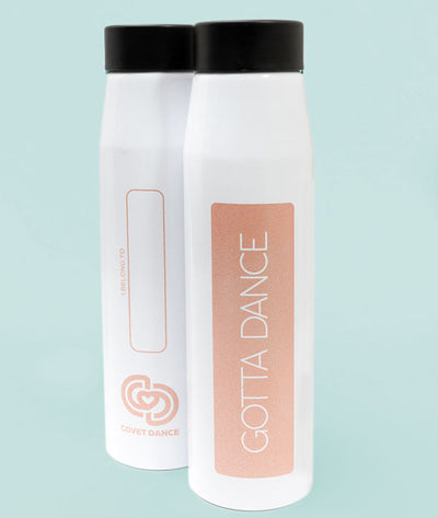 Back and Front of white Gotta Dance water bottle with peach sparkly imprint