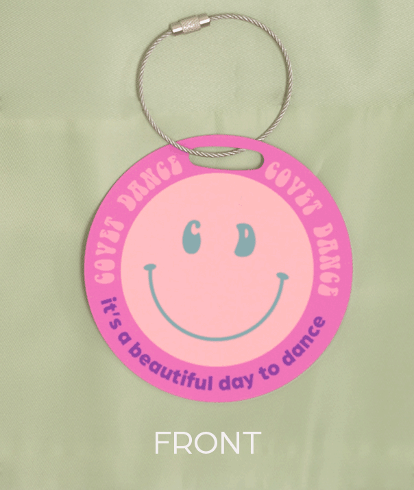 aluminum luggage tag in color with smiling face and dance quote