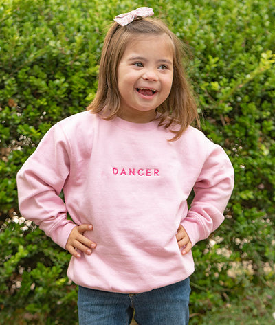 Toddler girl wearing dancer crewneck sweatshirt