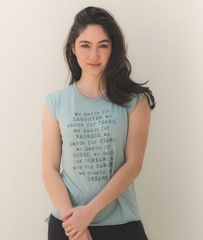 We Are The Dancers We Create the Dreams quote on flowy muscle tee